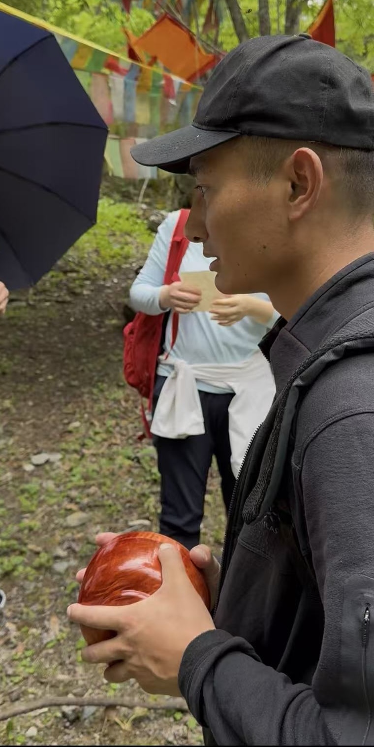 Beekeeper Zashi Cili at the apiary